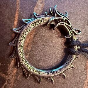 Elder scrolls Ebonheart pact ouroboros dragon necklace.